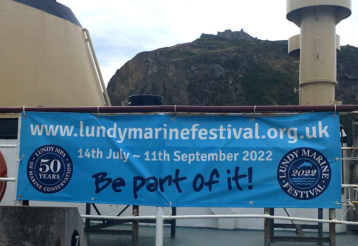 A banner advertising the Marine Festival attached to the upper deck railings of the MS Oldenburg &copy; Robert Irving